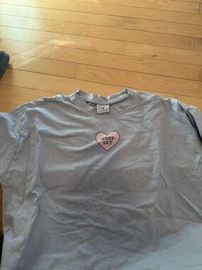 Gymshark Light Blue Tee with Pink Heart Graphic